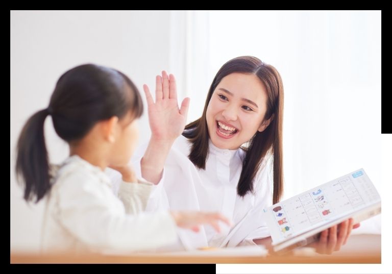 teacher high-fiving student